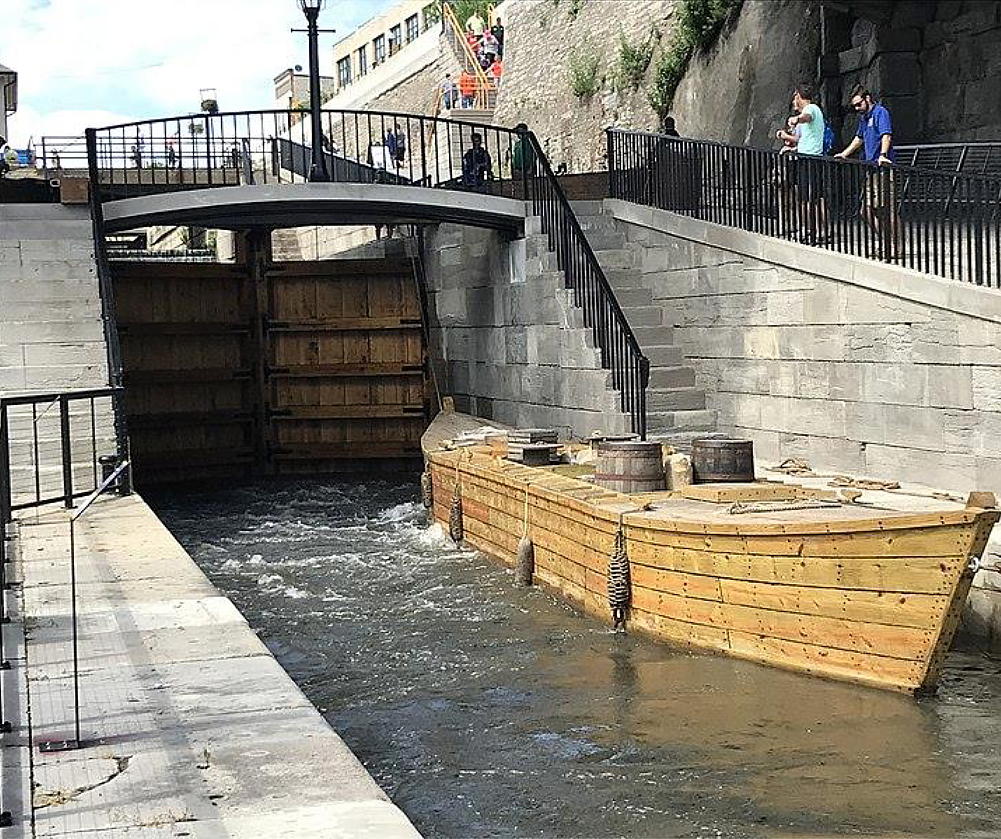 Replica of a Durham boat in a Canal Lock at Lockport, New York