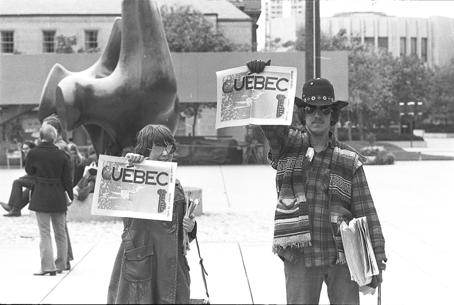 Guerilla newspaper vendors at anti War Measures Act demonstration, Toronto.