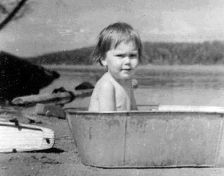 Christine on the beach at camp, 1951