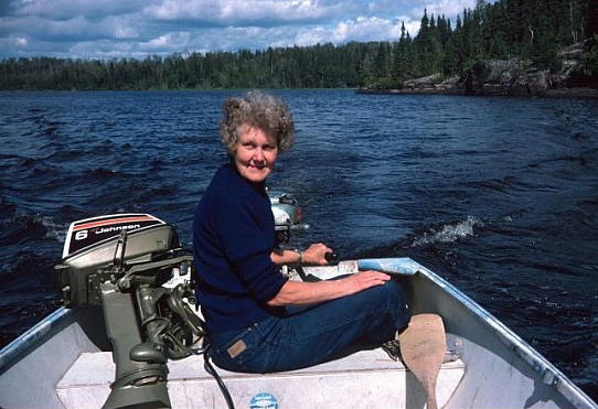 Mum using her old outboard motor -1975