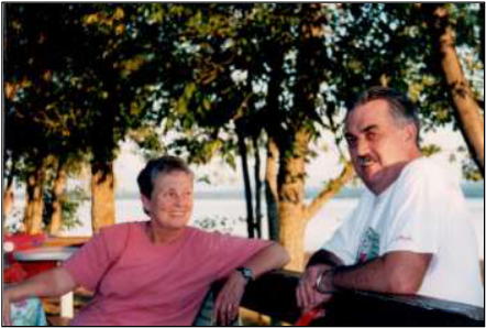 'Ernie and Sandy Bies sitting on their dock