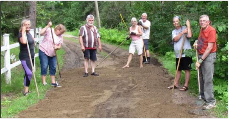 Sleepy Hollow neighbours raking gravel