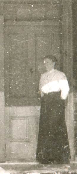 enlargement of woman in doorway