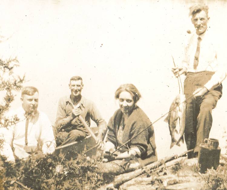 four people on fishing expedition