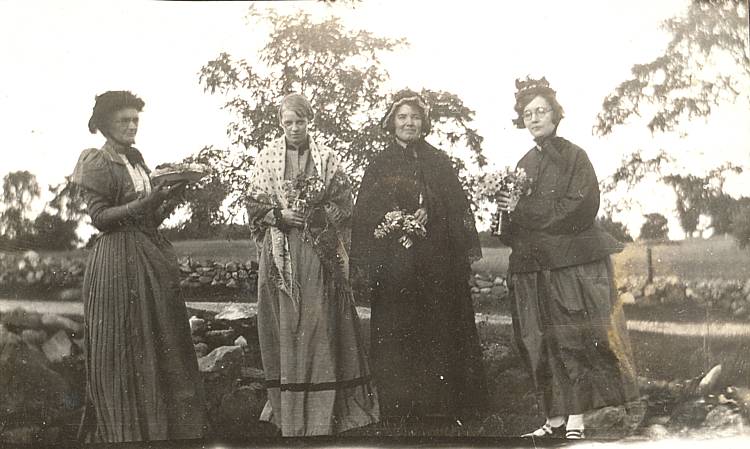 four women possibly a wedding party