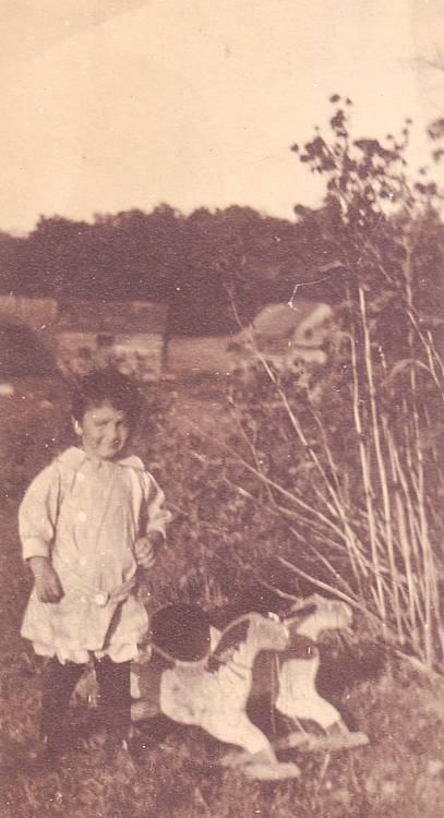 child with rocking horse