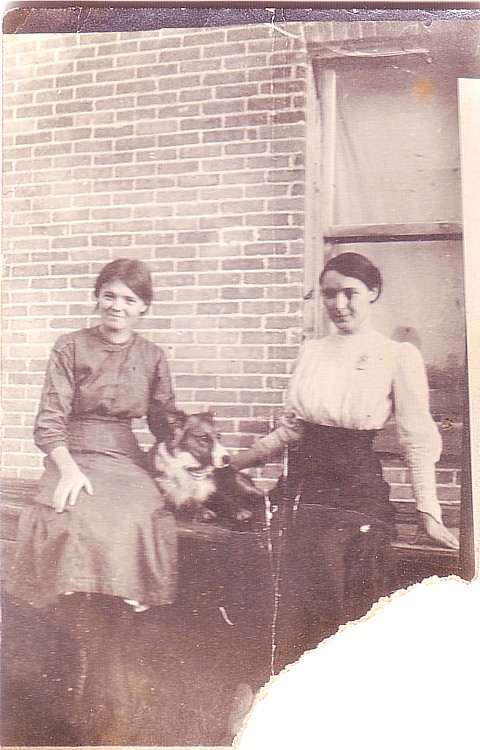 two women with a dog