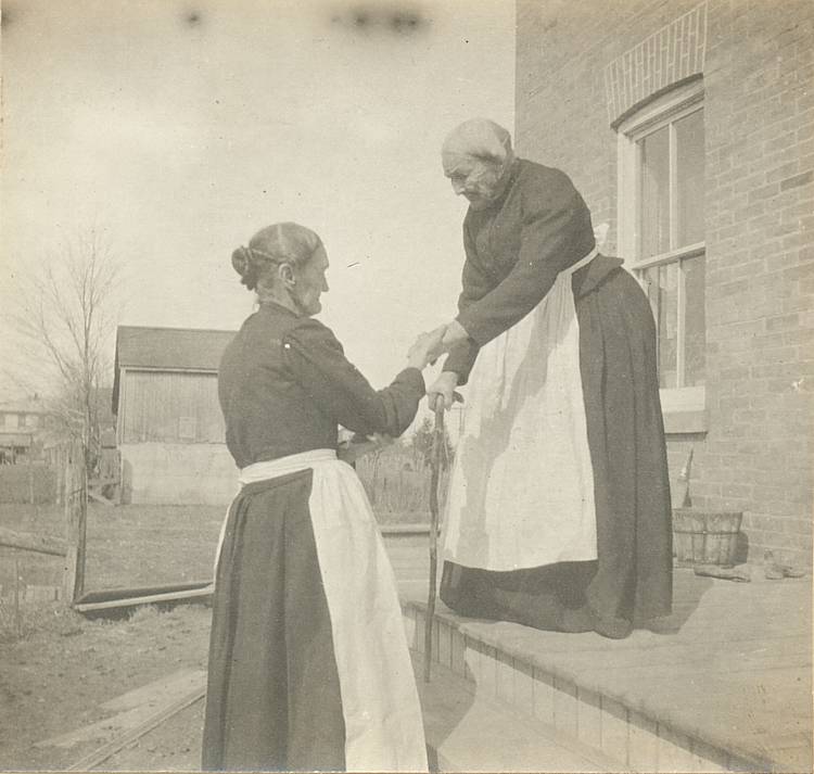 two elderly farm women