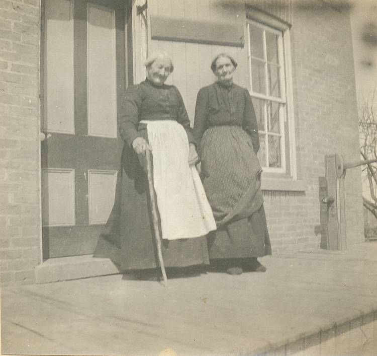 two elderly farm women